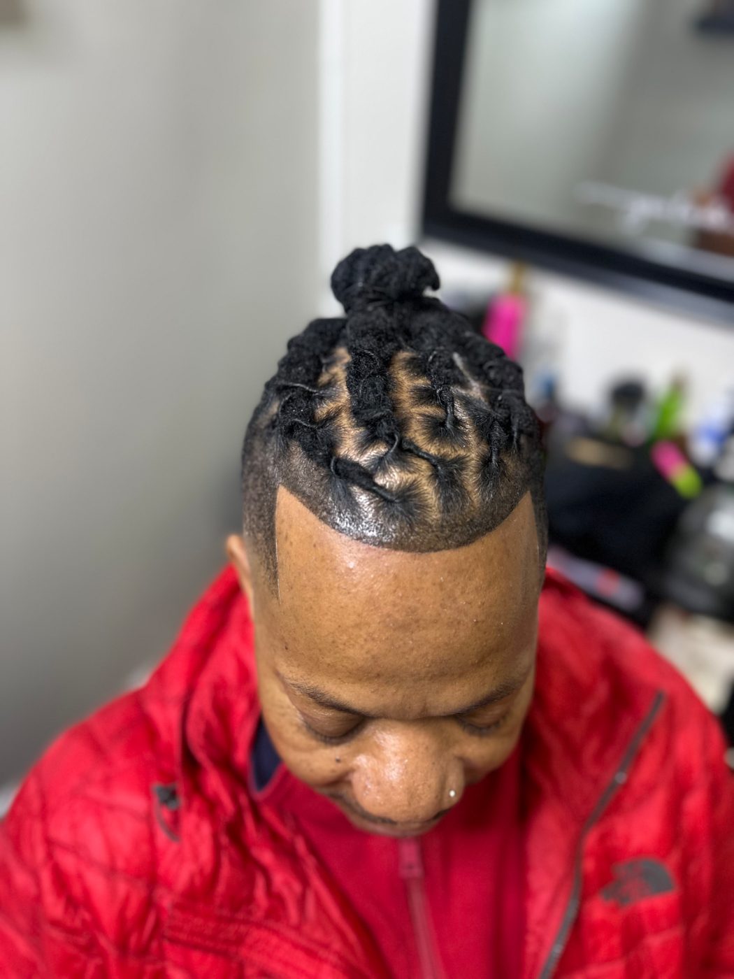 Fresh retwist with topknot